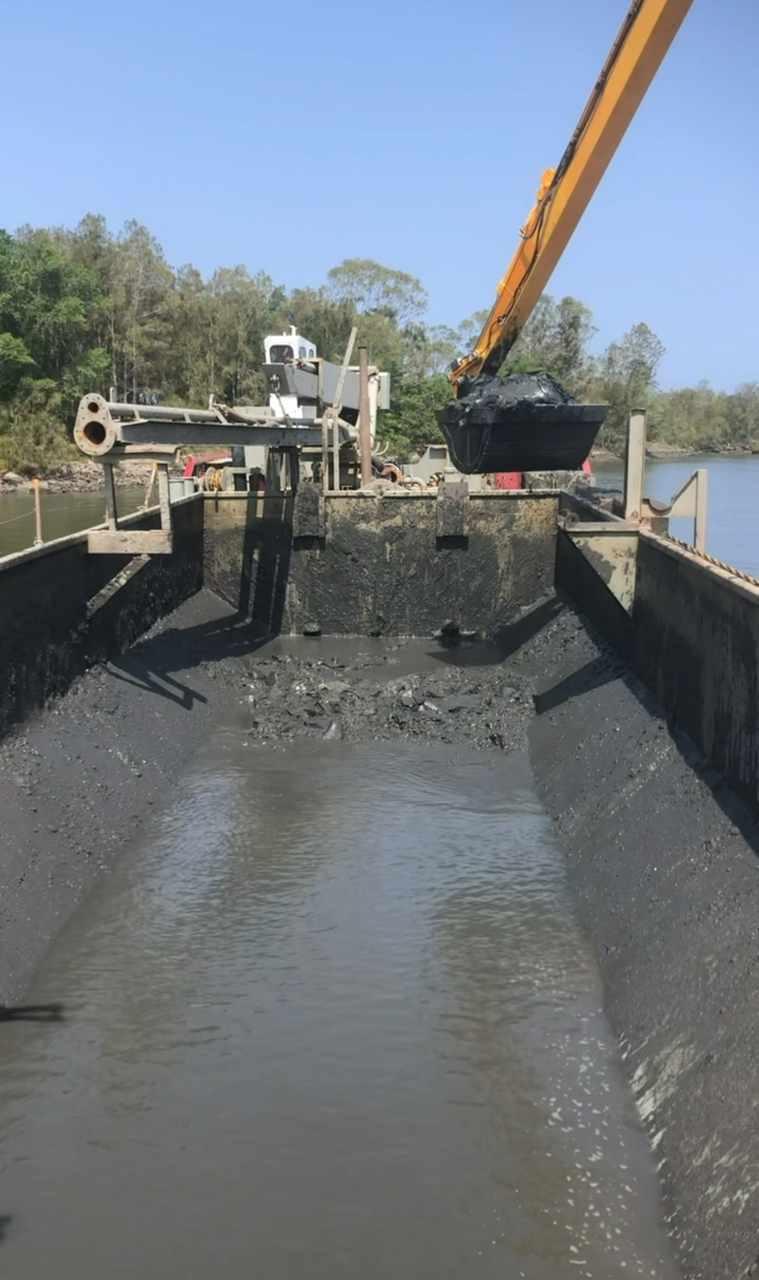 Dredging vessel in operation